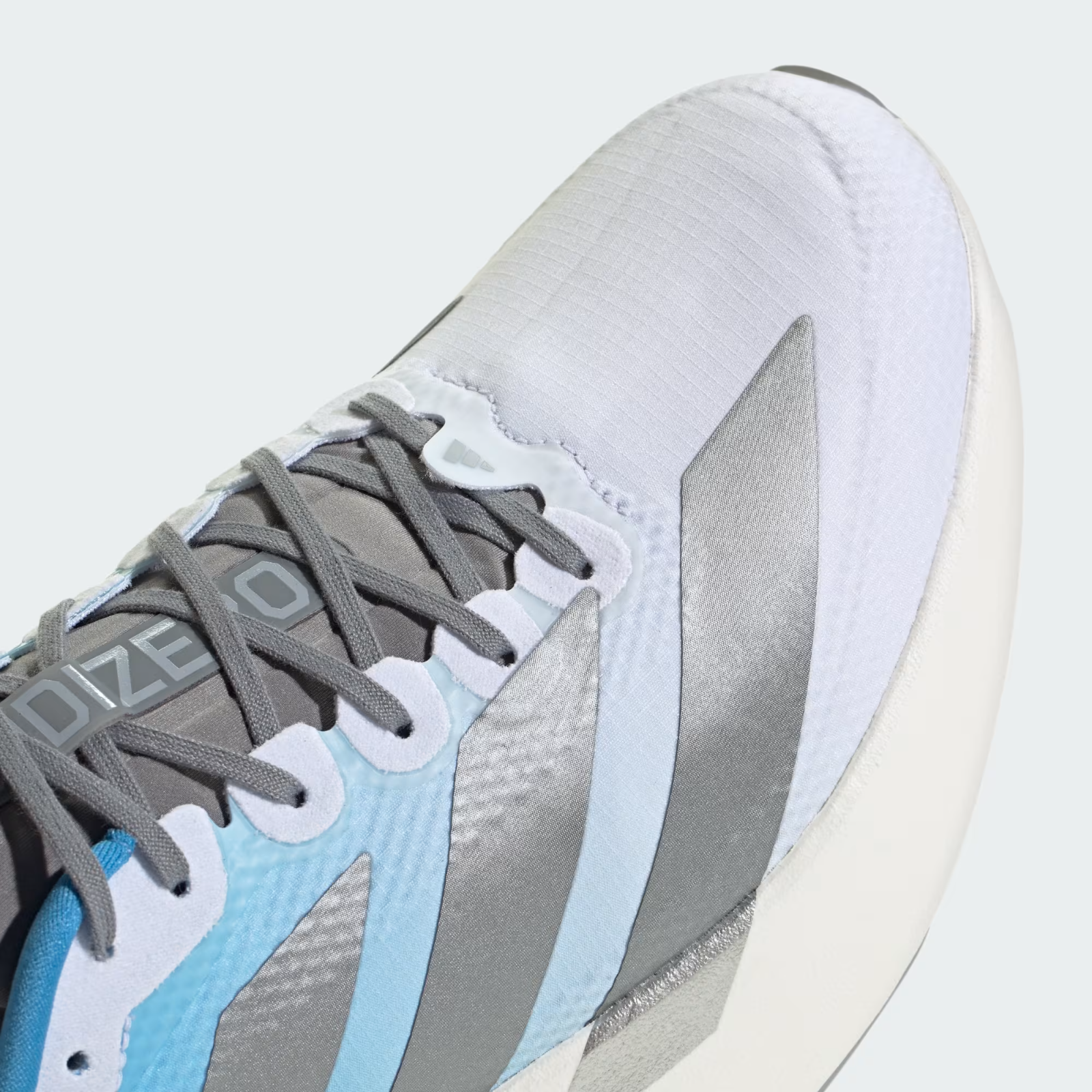 Adidas ADIZERO EVO SL Trainers in White and Blue Shoes