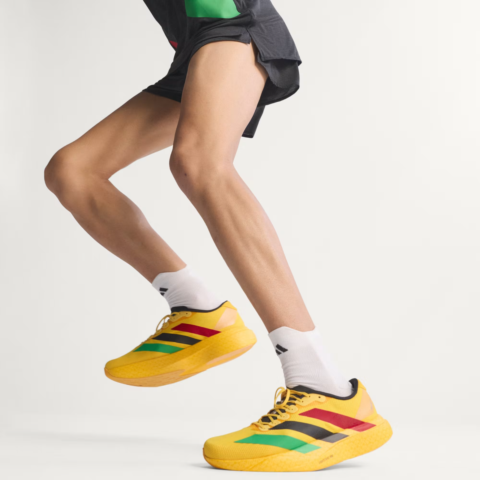 Adidas ADIZERO EVO SL Trainers in Bold Gold/Vivid Green/Pure Ruby Shoes