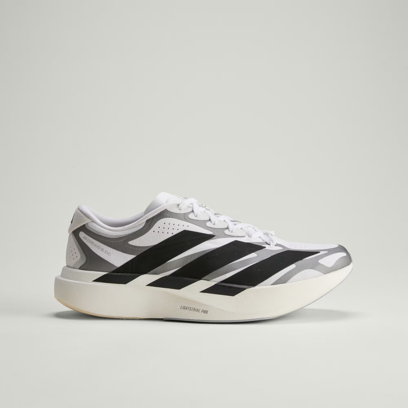 Adidas ADIZERO EVO SL EXO Shoes in Cloud White/Core Black/Iron Metallic