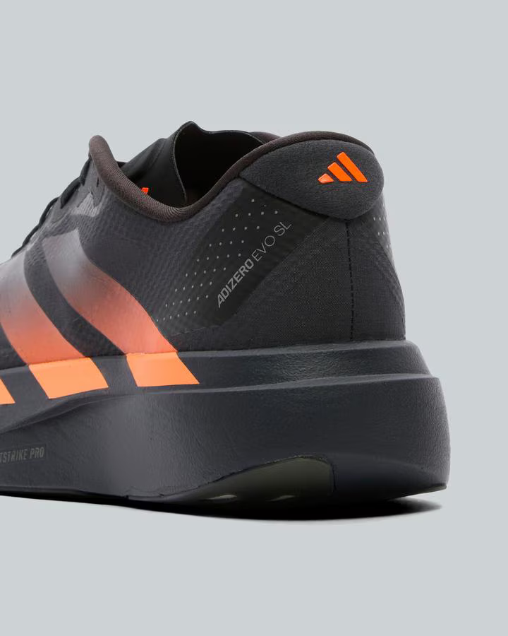 adidas ADIZERO EVO SL Trainers in Carbon / Black Lucid Orange Shoes