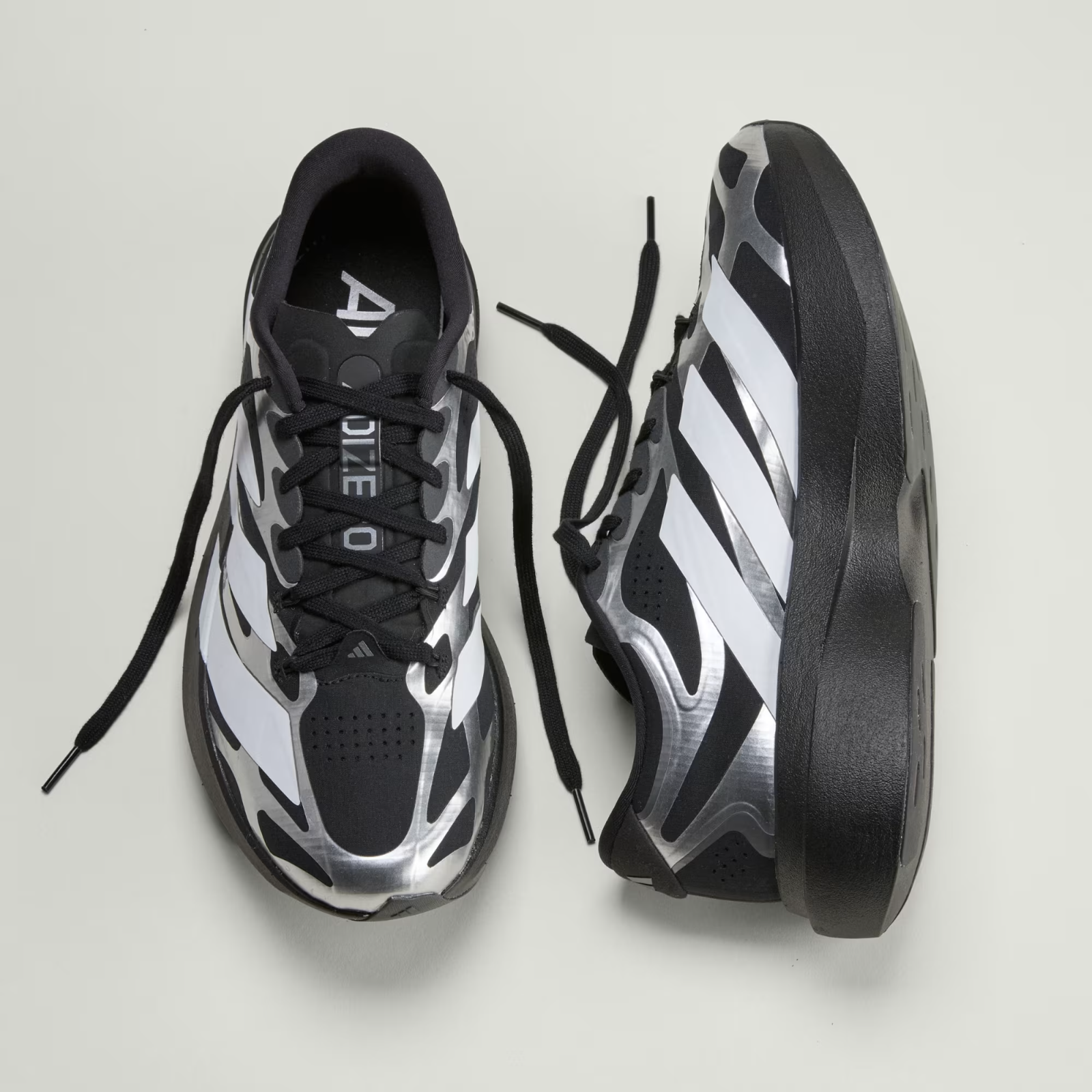 Adidas ADIZERO EVO SL EXO Shoes in Black/Cloud White/Iron Metallic