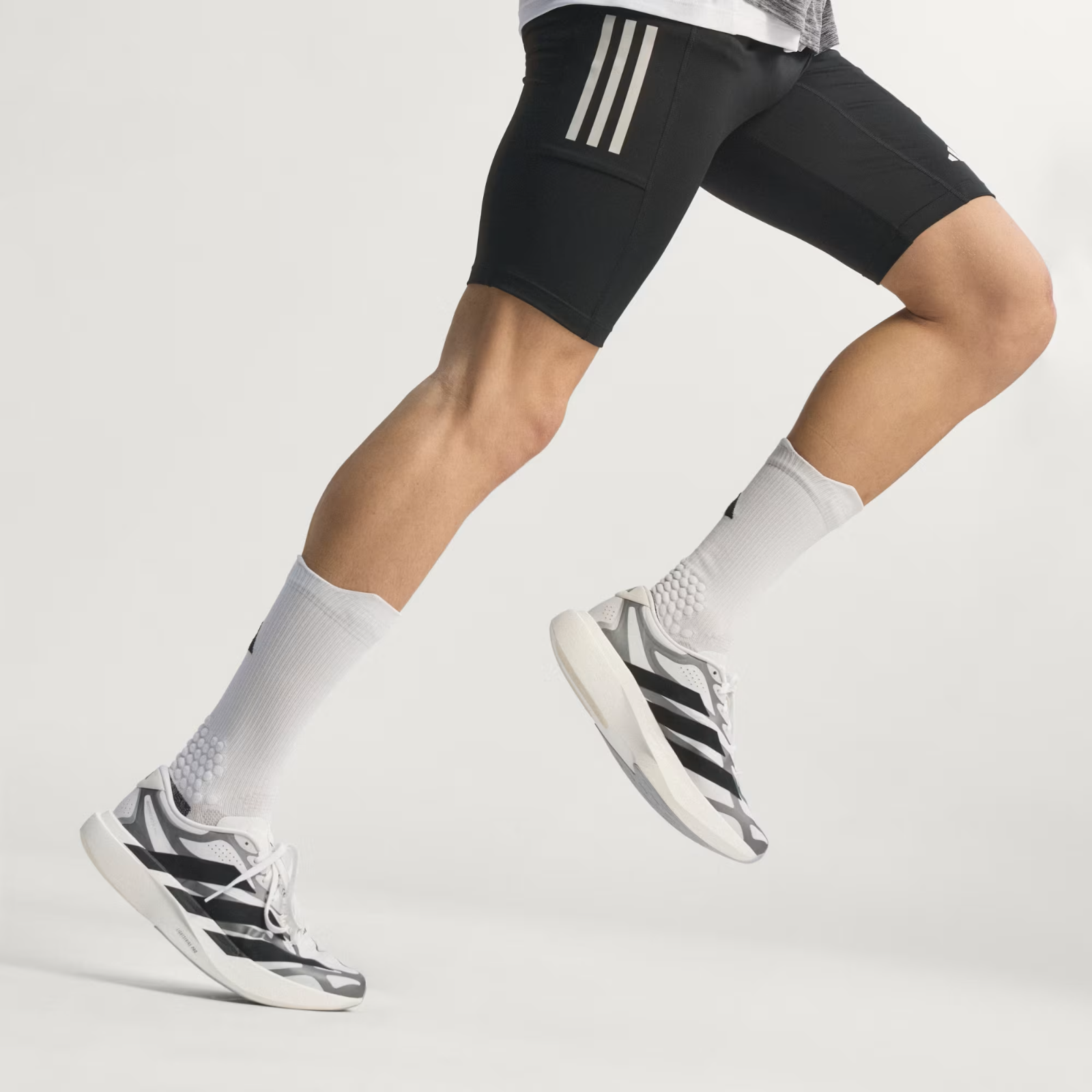 Adidas ADIZERO EVO SL EXO Shoes in Cloud White/Core Black/Iron Metallic