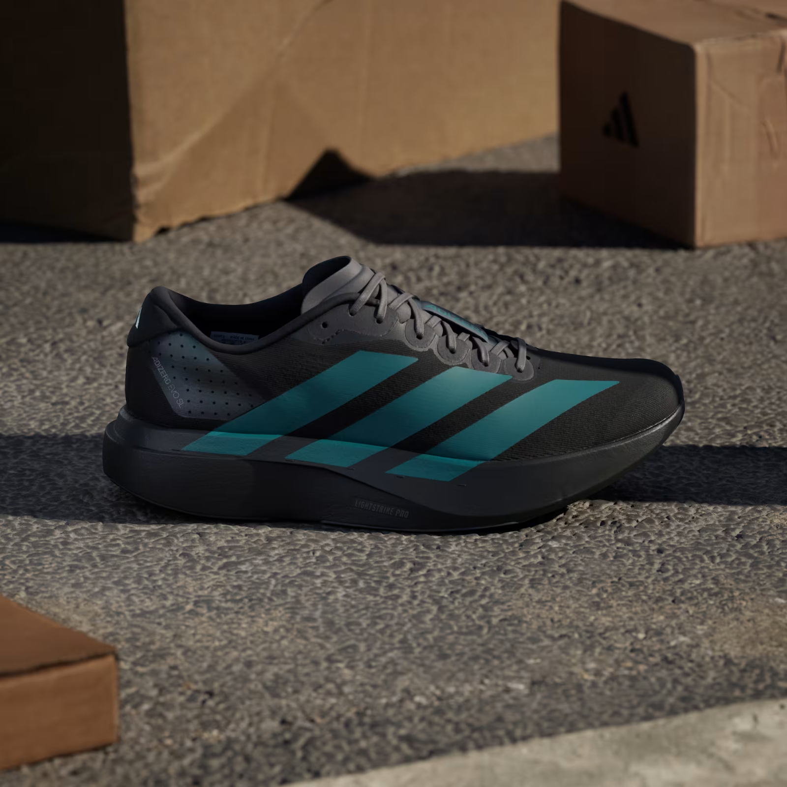 Adidas Adizero Evo SL Shoes in Black/Pure Teal/Grey Four