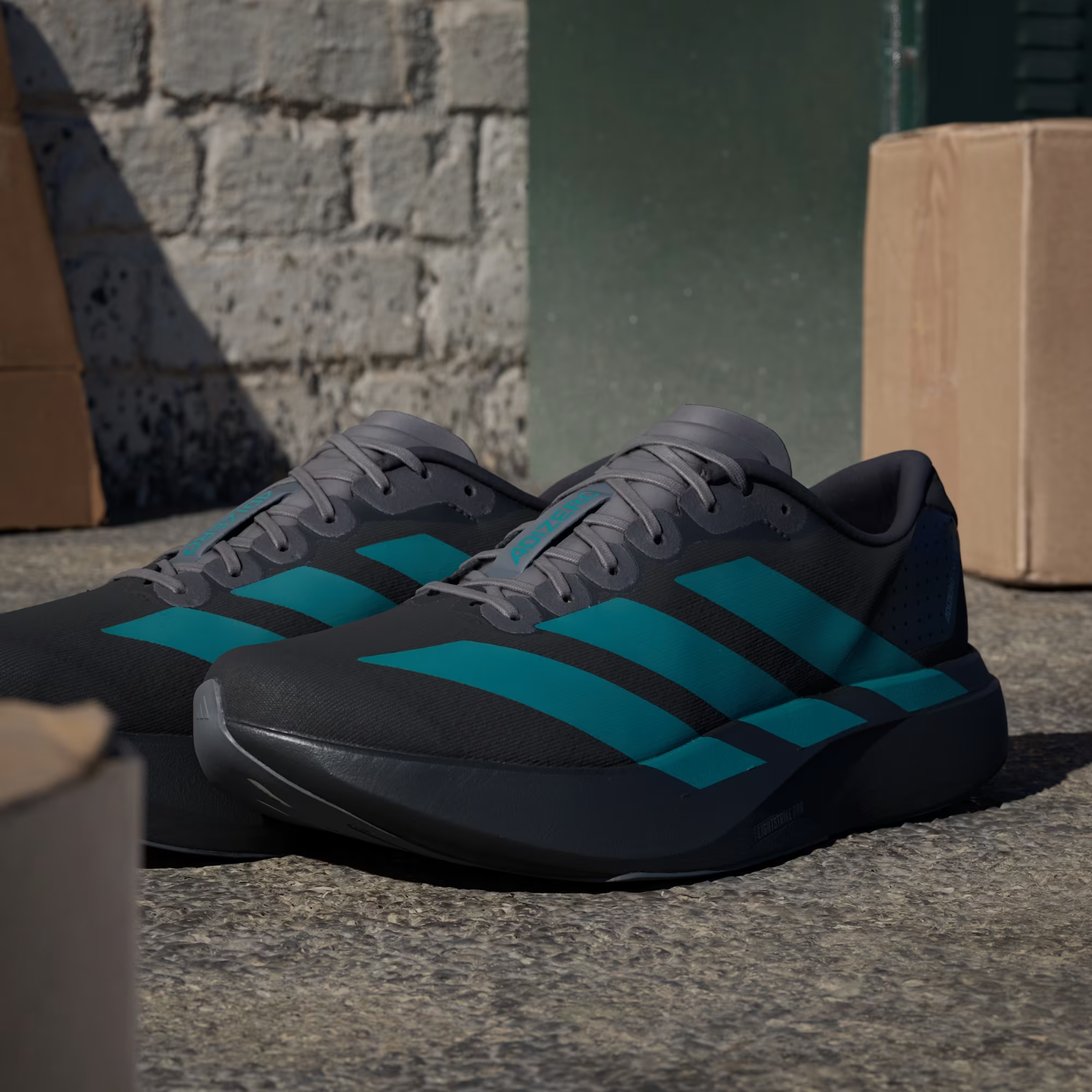 Adidas Adizero Evo SL Shoes in Black/Pure Teal/Grey Four