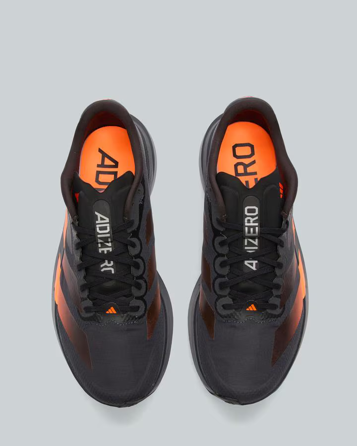 adidas ADIZERO EVO SL Trainers in Carbon / Black Lucid Orange Shoes