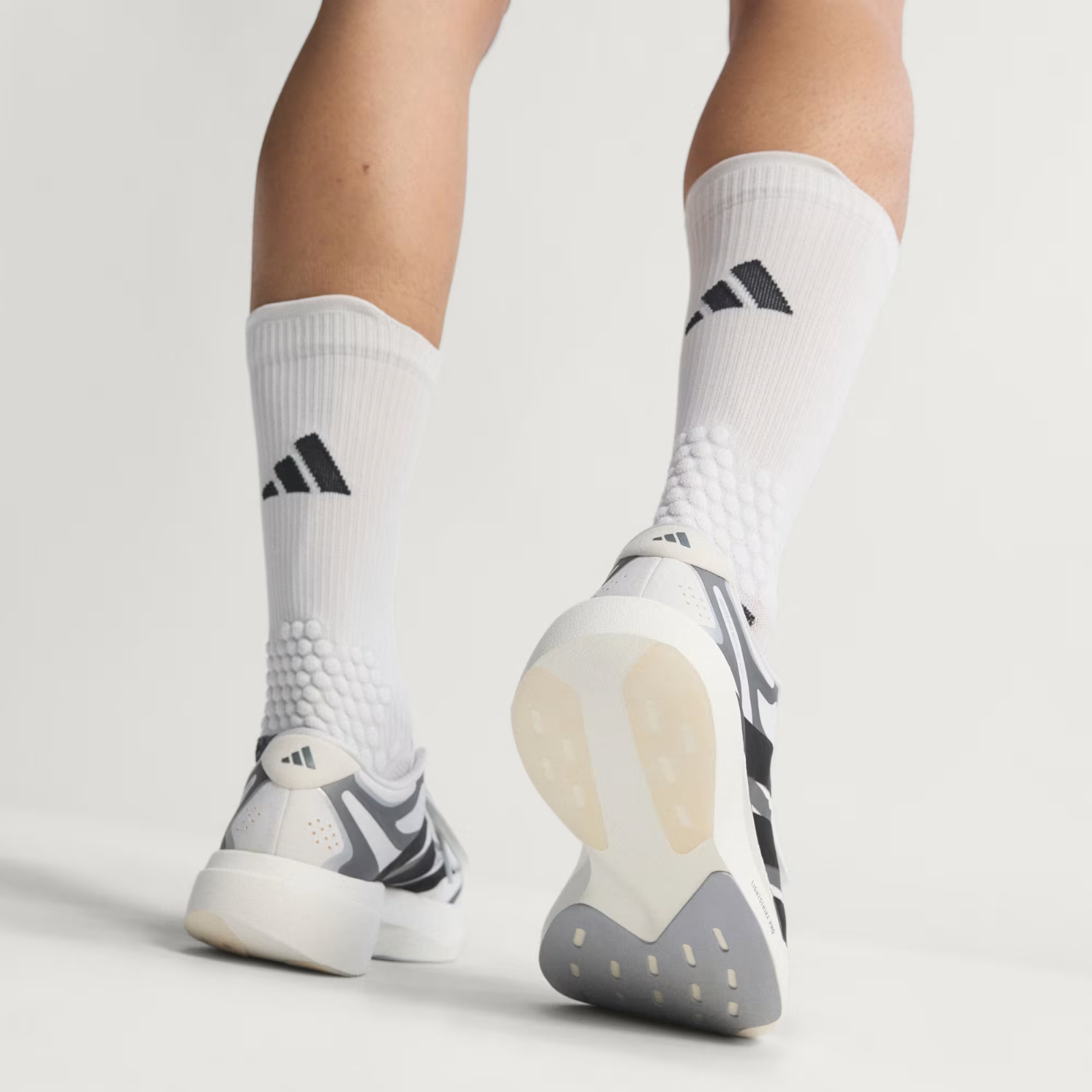 Adidas ADIZERO EVO SL EXO Shoes in Cloud White/Core Black/Iron Metallic