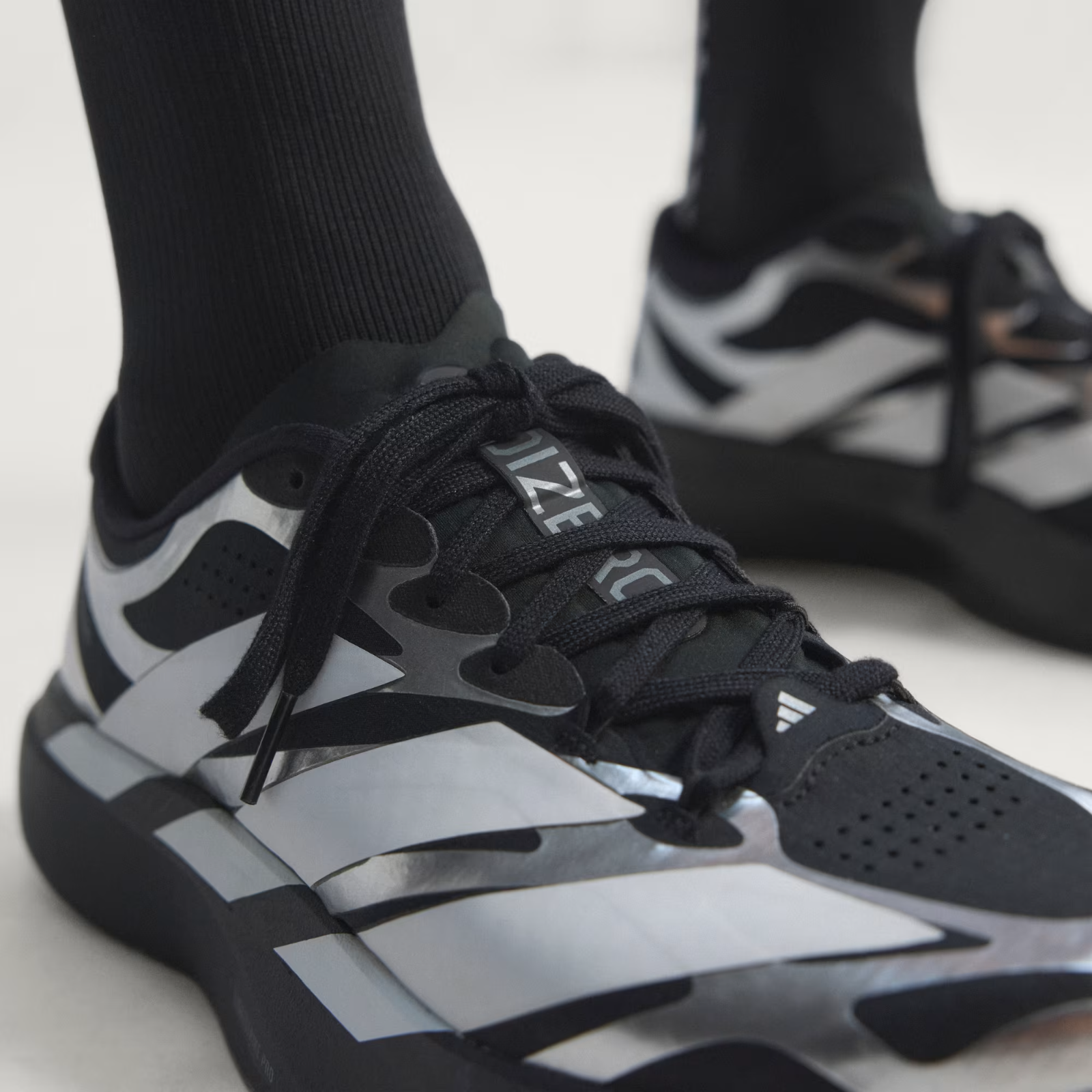Adidas ADIZERO EVO SL EXO Shoes in Black/Cloud White/Iron Metallic